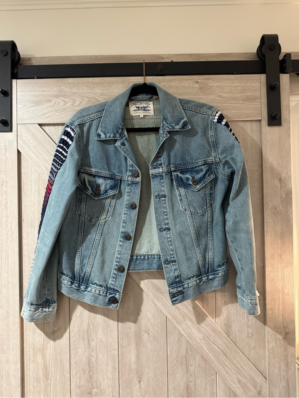 Light Blue Denim Jacket with Striped Sleeve Accents